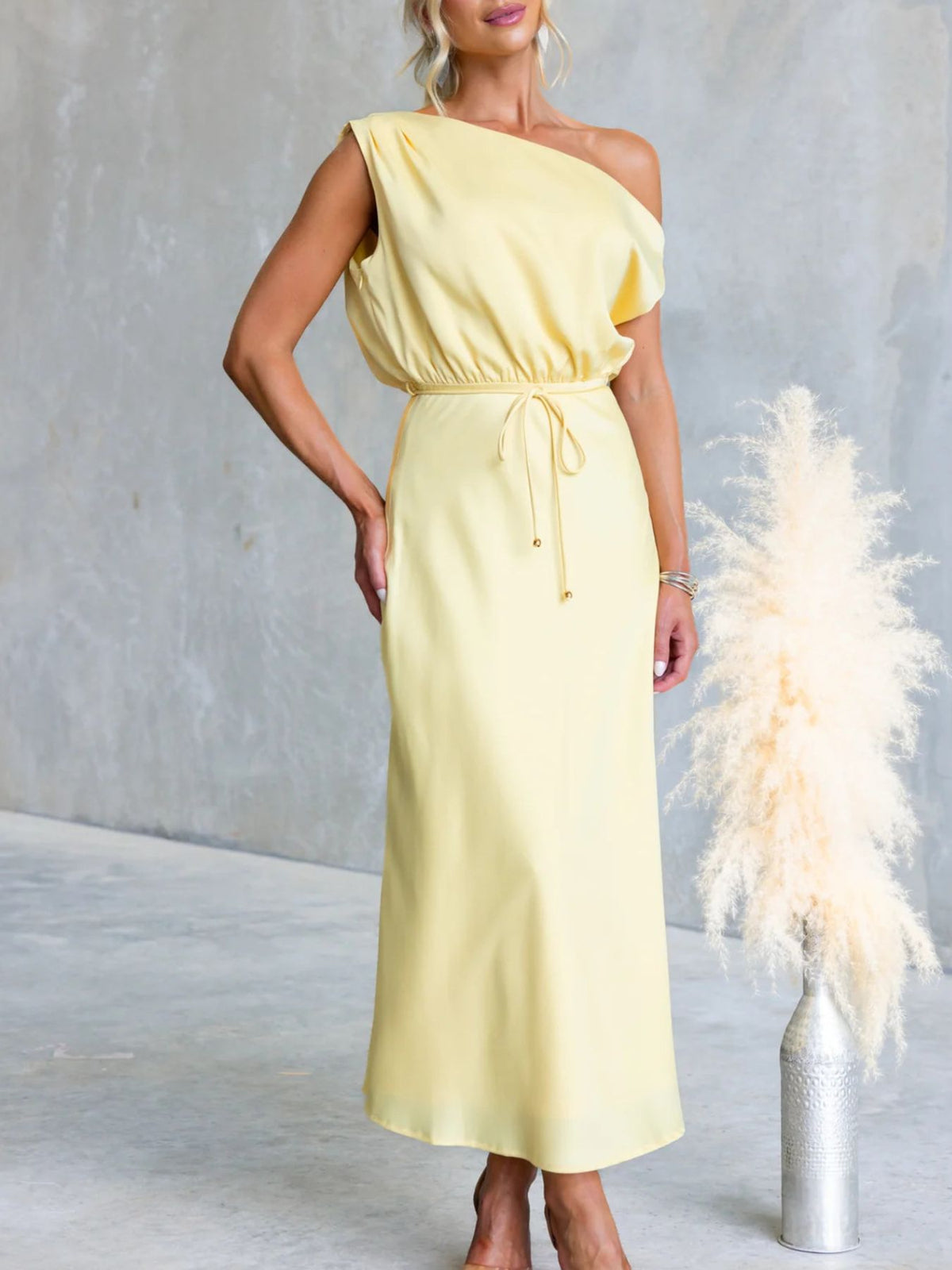 Yellow one-shoulder maxi dress with tie waist, front view