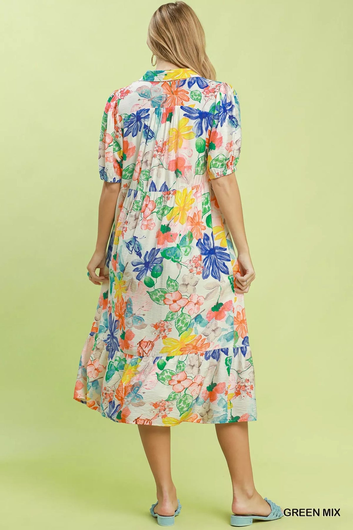 Tiered skirt and ruffle detail on the green watercolour floral midi dress