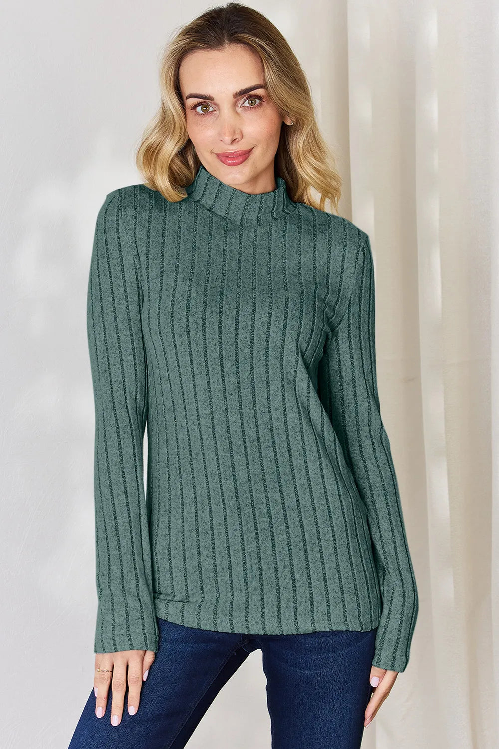 Turquoise ribbed mock neck long sleeve tee with wide vertical ribs, front view