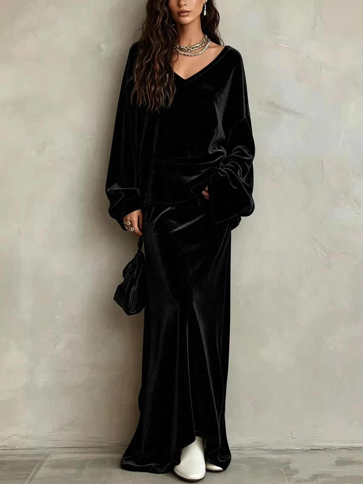 Black velvet V-neck long sleeve top and maxi skirt two-piece set, full-length front view