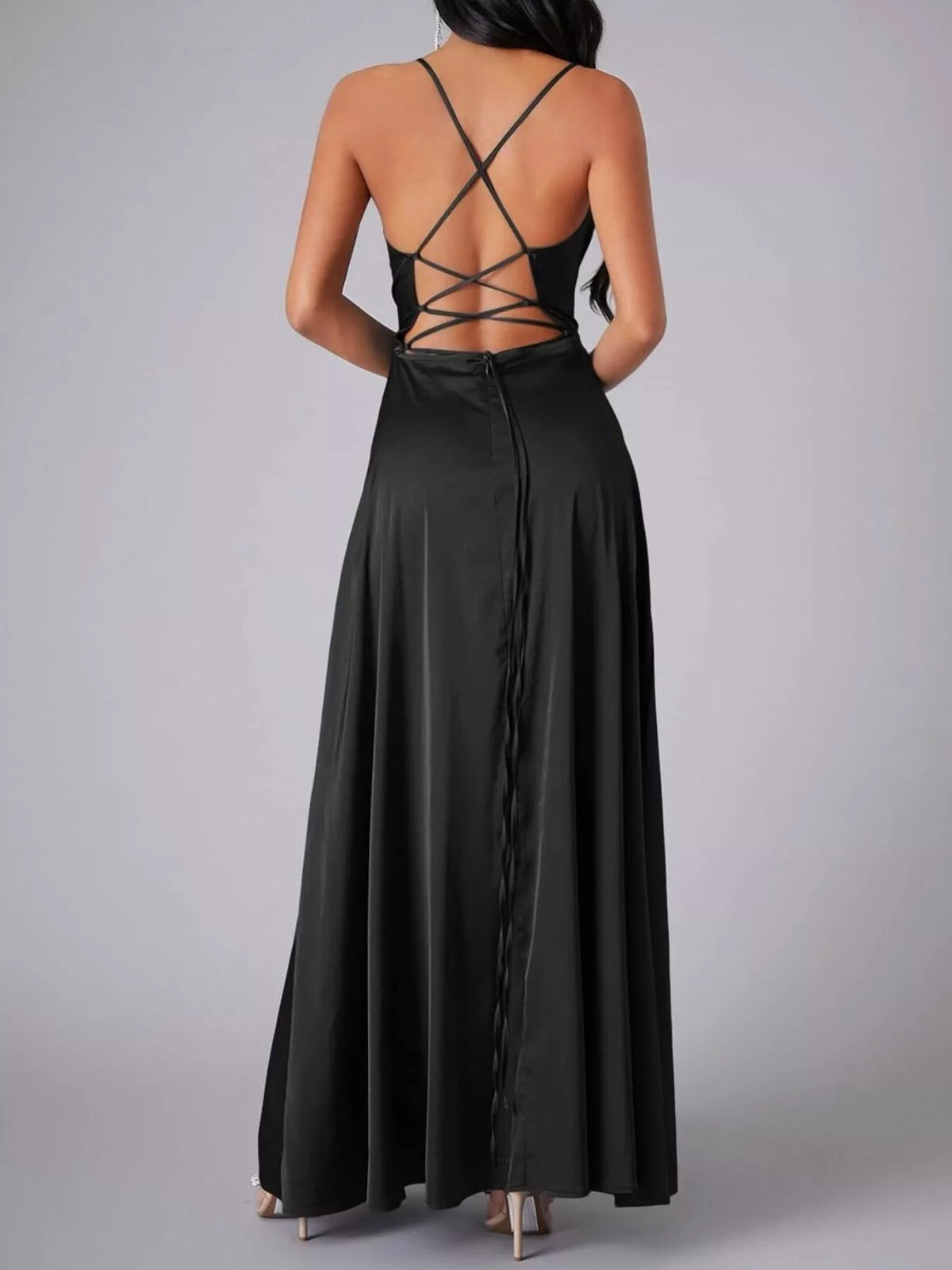 Black glossy cowl-neck maxi dress, back view showing the lace-up back and back zip