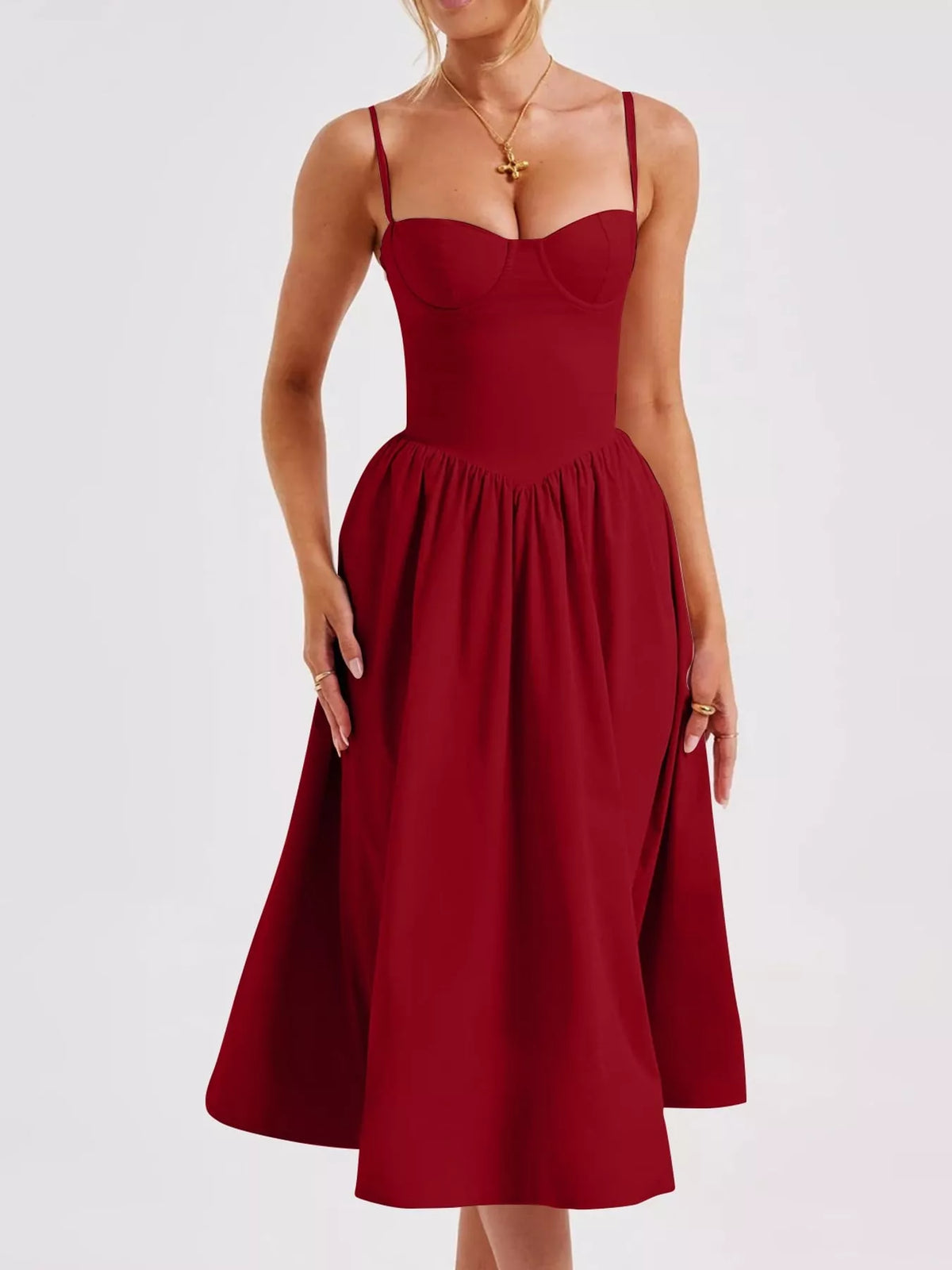 Red (a deep red) sweetheart-neck midi dress with spaghetti straps and full gathered skirt, front view