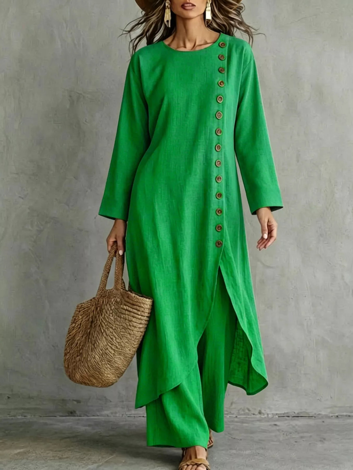 Green longline top with a row of buttons down one side and matching pants, front view