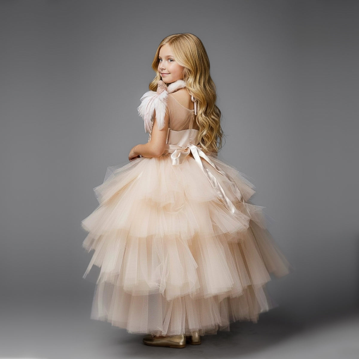 Champagne Ayla dress showing the multi-layered tulle hi-low skirt