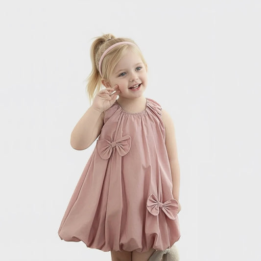 Pink cotton bow dress for girls, front view