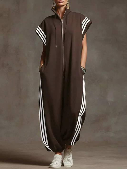 Brown zip-front jumpsuit with a stand collar, cap sleeves and white contrast side stripes, gathered at the ankle, front view