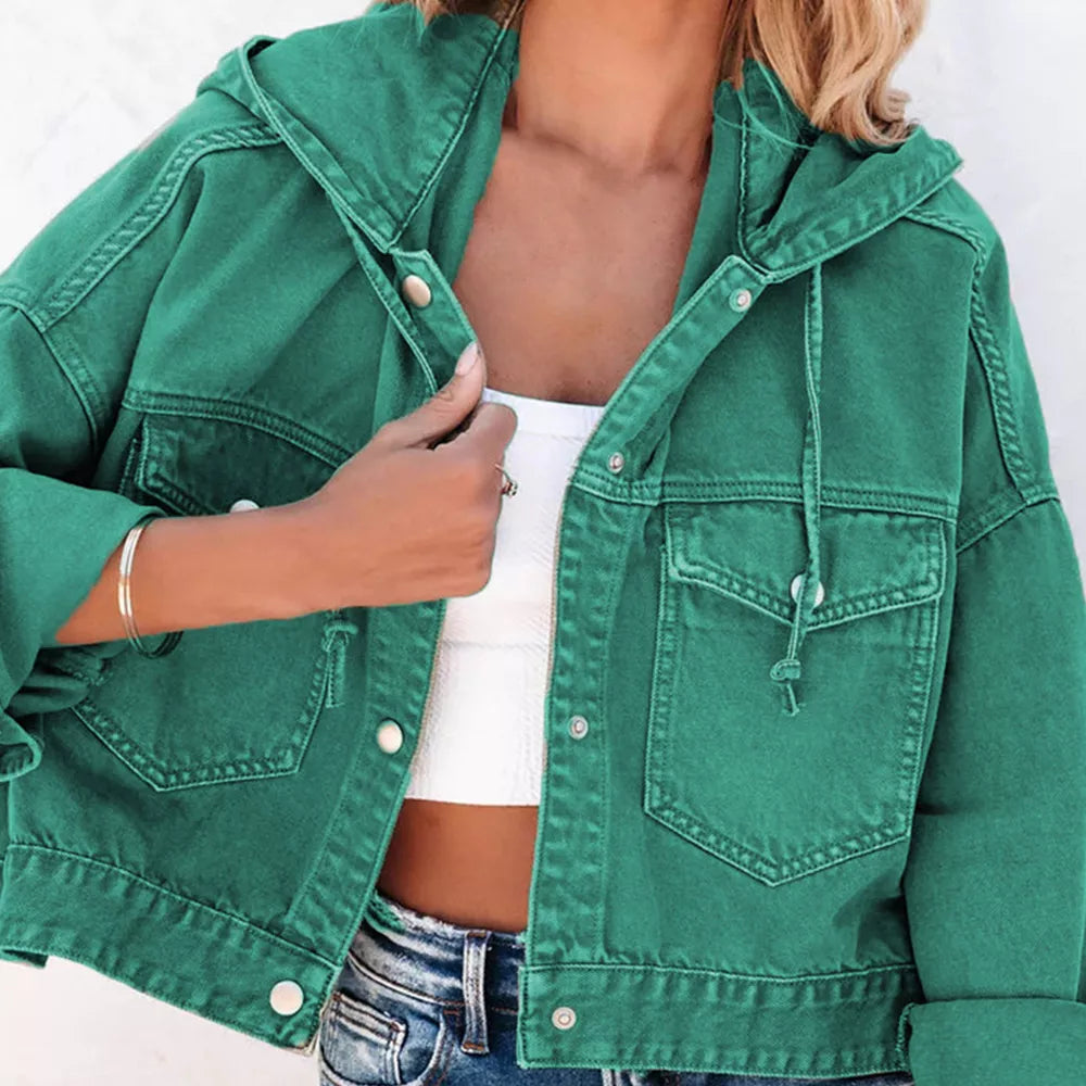 Close view of the teal hooded denim jacket collar, drawstring and chest pocket