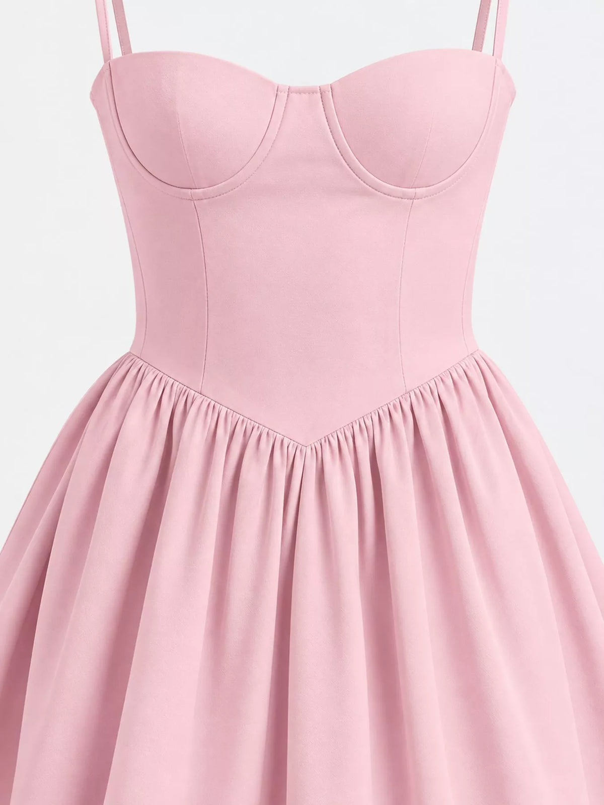 Close view of the Pink midi dress bodice with seamed cups and gathered V-shaped waist seam