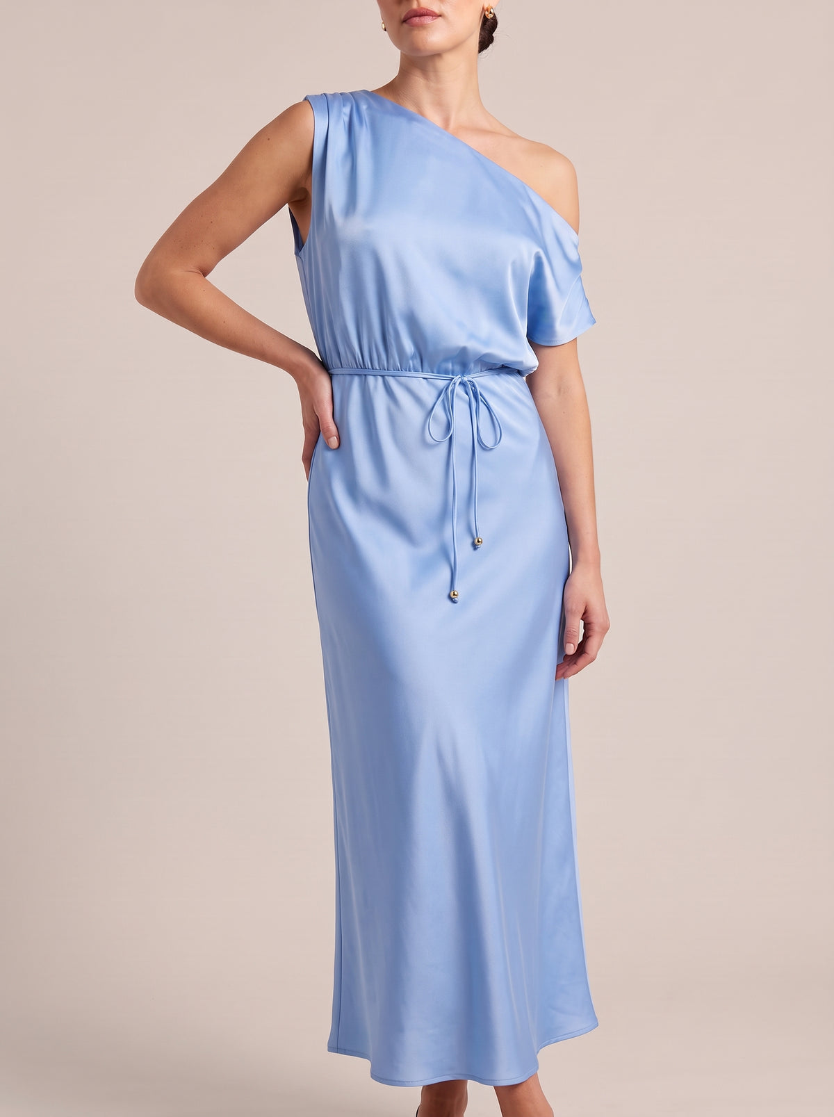 Light Blue one-shoulder maxi dress with tie waist, three-quarter front view
