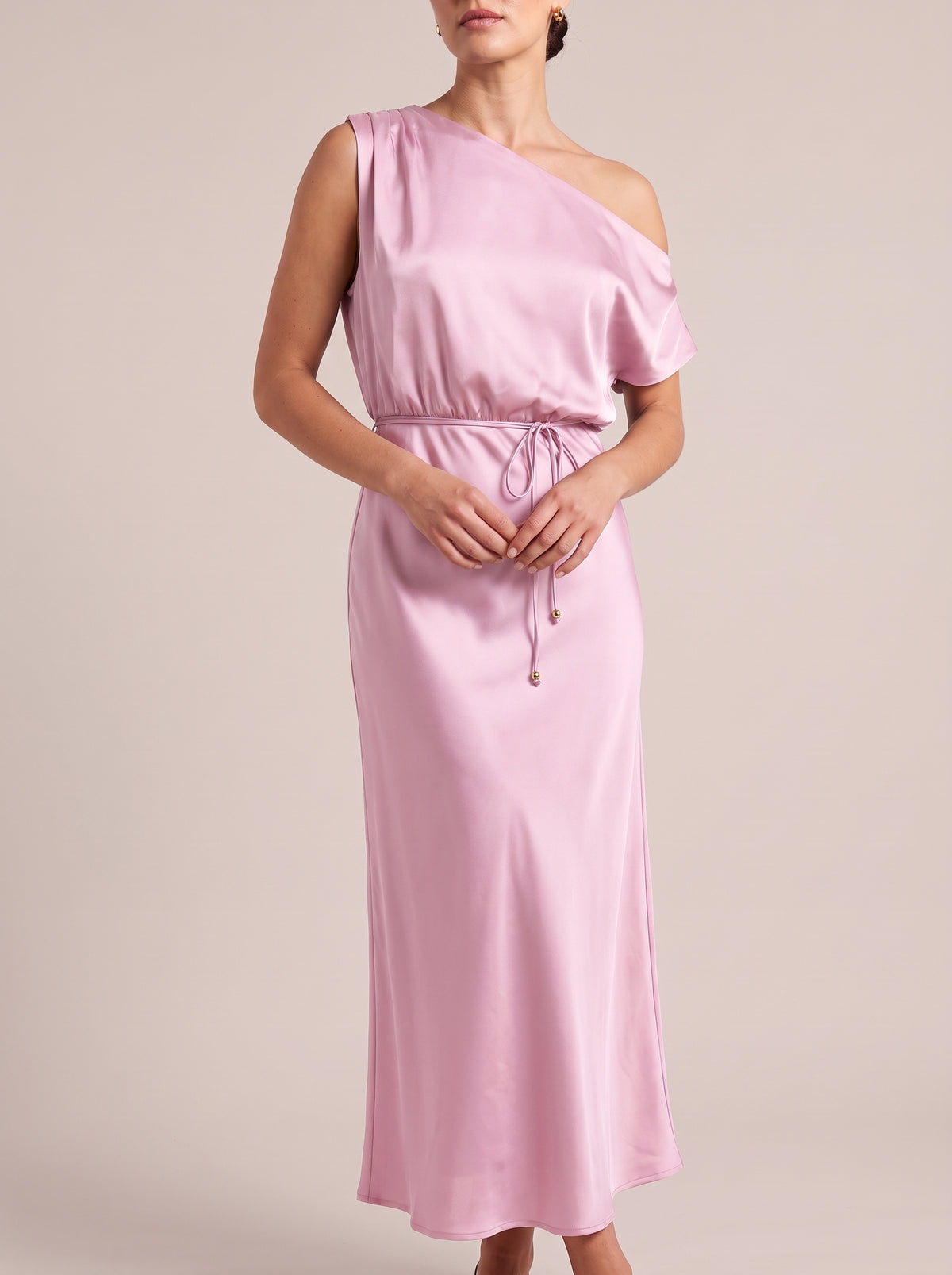 Pink one-shoulder maxi dress with tie waist, front view