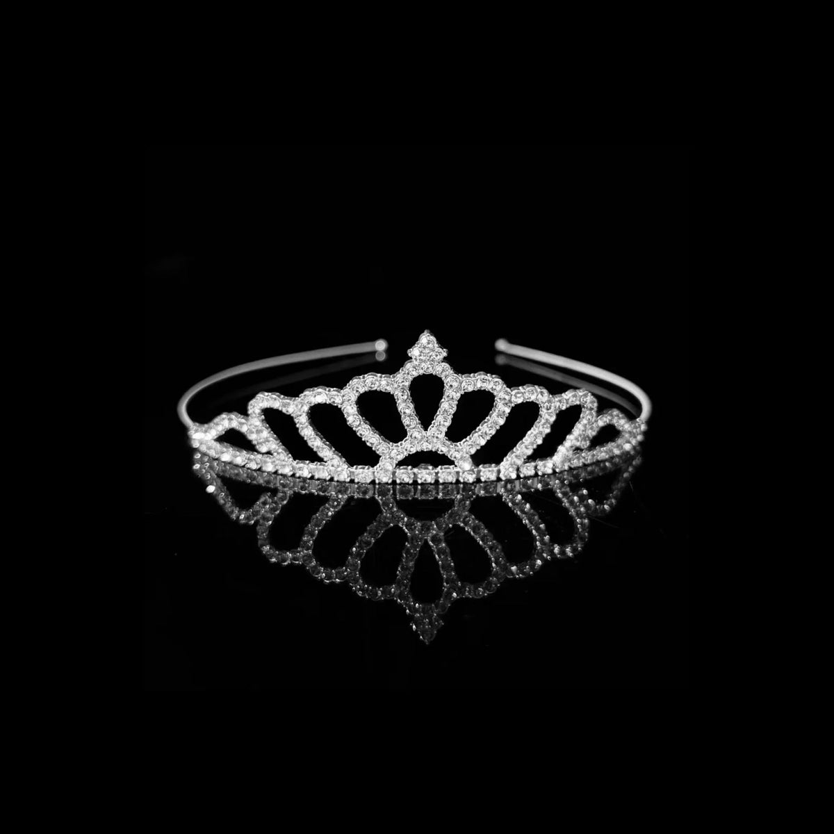 Silver tiara with large open teardrop loops fanning out from a pointed centre