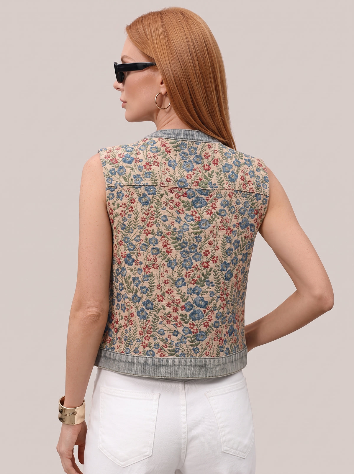 Back of the floral vest top showing the denim hem band