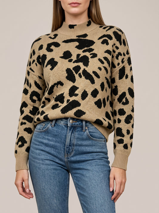 Khaki knit mock neck sweater with a black leopard-style spot pattern, dropped shoulders and ribbed cuffs, front view