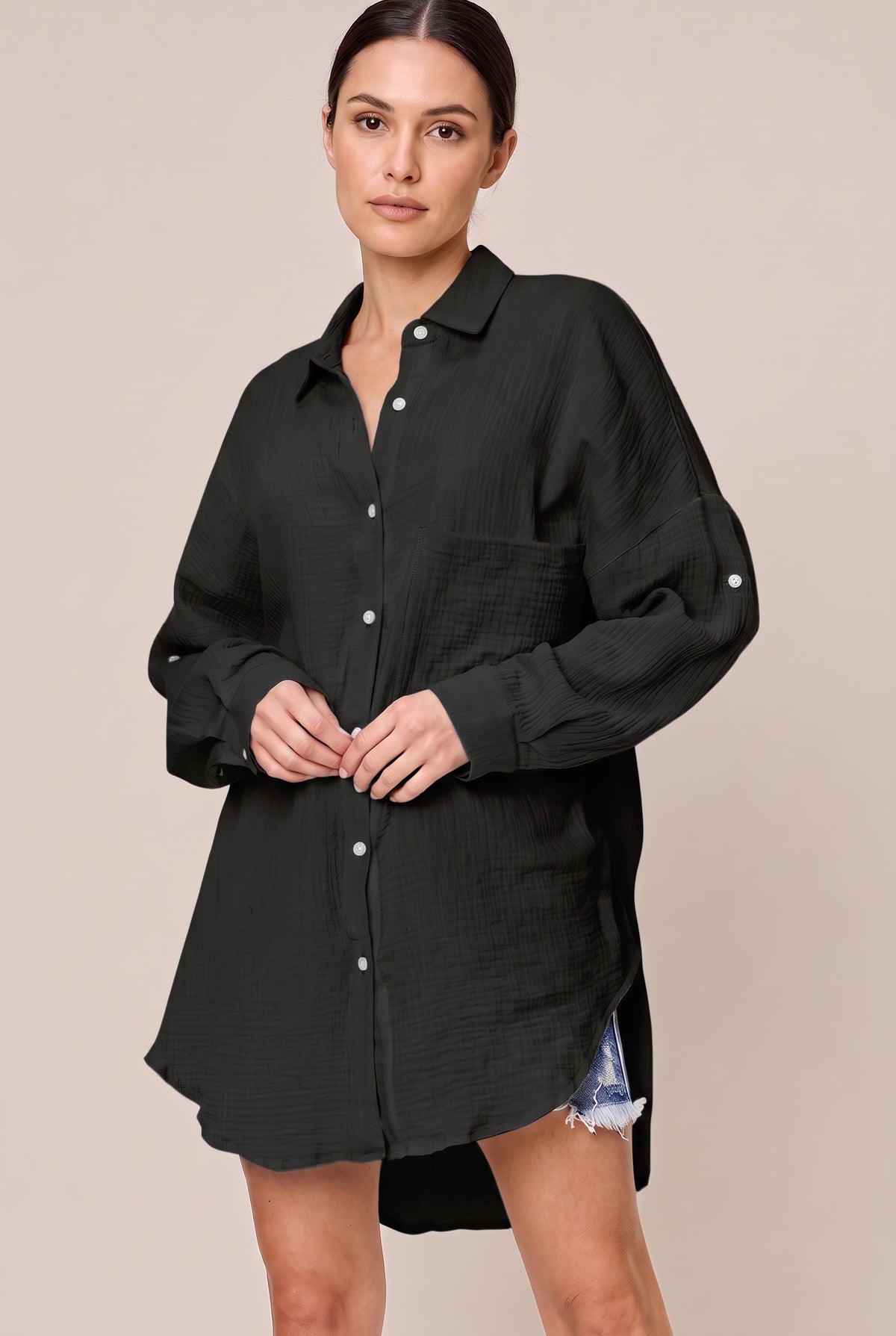 Black long sleeve textured cotton button-up shirt with a chest pocket, front view